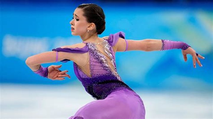 Adam Rippon, Tara Lipinski, & More React To Kamila Valieva’s Olympic Short Program: This Is A ‘Disgrace’