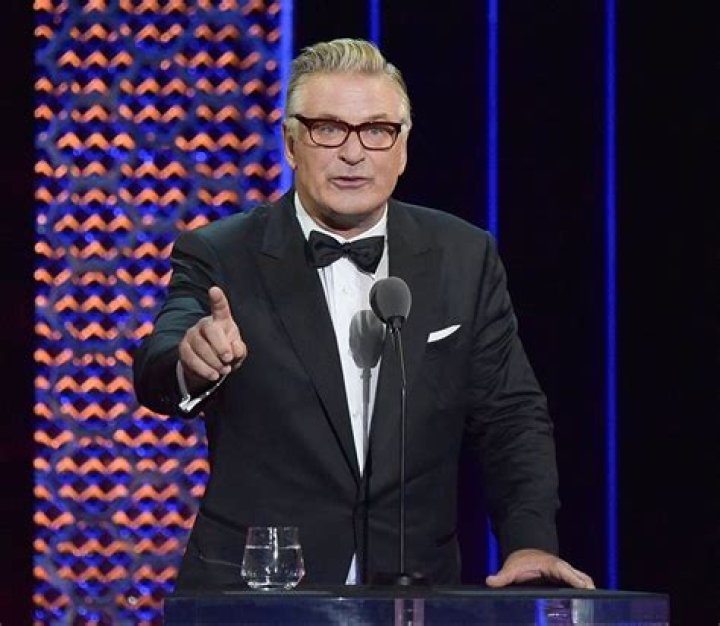 Alec Baldwin Shares Kiss With Hilaria Under The Mistletoe Amid Ongoing ‘Rust’ Shooting Investigation