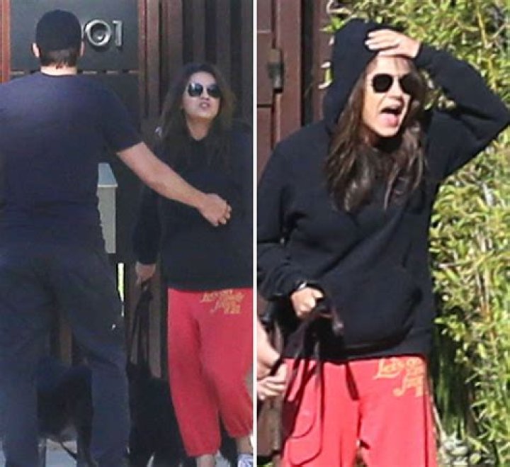 Ashton Kutcher Restrains Pregnant Mila Kunis As She Yells At Paparazzi