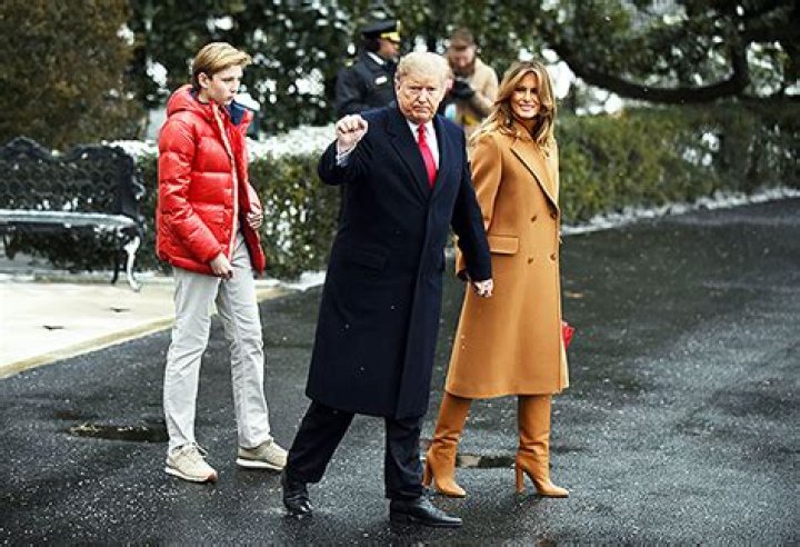 Barron Trump, 12, Looks Adorable In Red Puffy Coat As Melania Wears $5K Outfit For Family Vacation With Donald