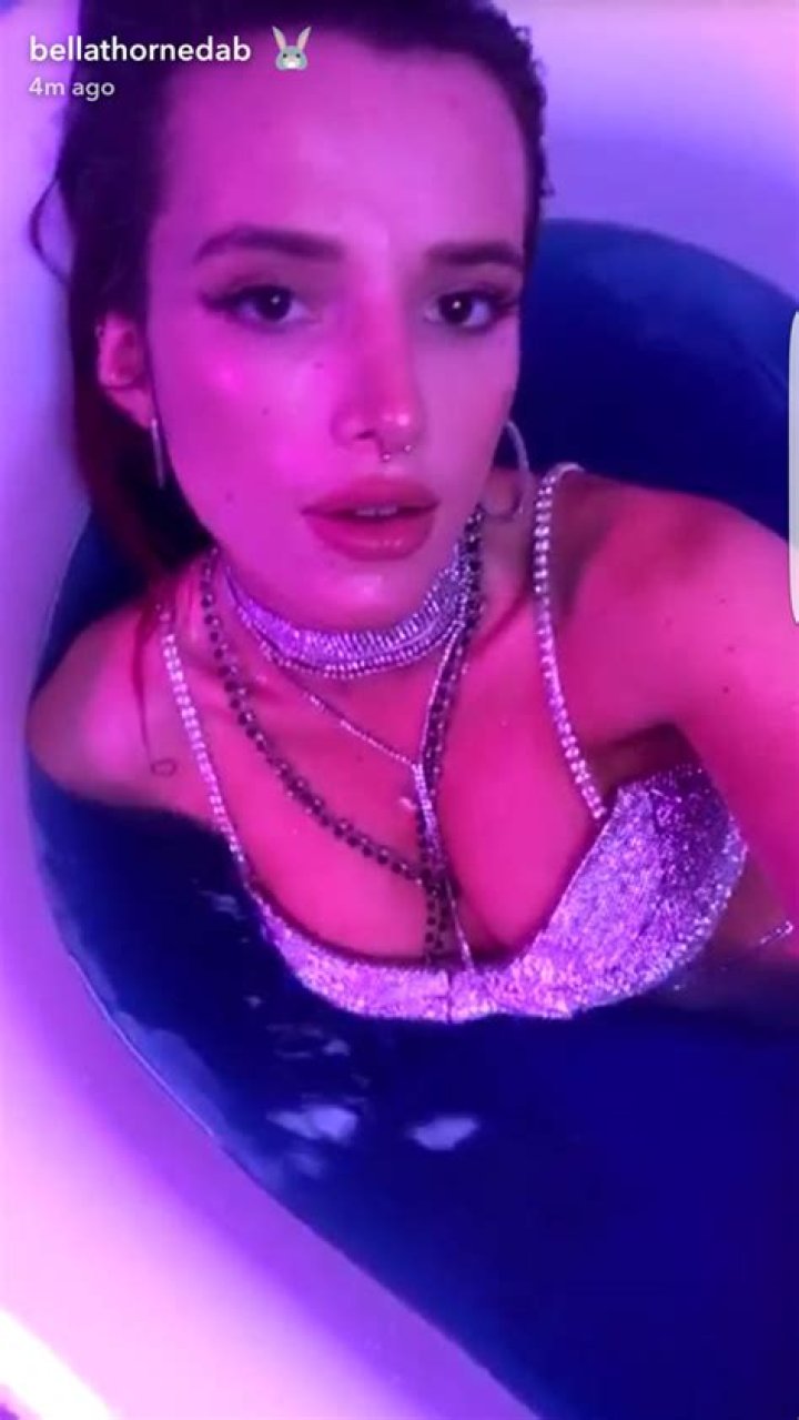 Bella Thorne Gets Wet & Wild In A Bathtub While Rocking Tiny Diamond Bikini – Pics