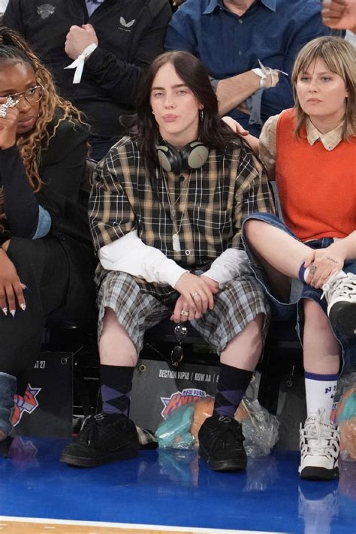 Billie Eilish Rocks A Plaid Mini Skirt & More While Debuting New Clothing Collection