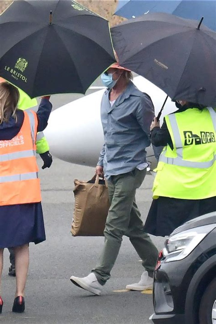 Brad Pitt Copies Nicole Poturalski’s Look With Pink Hat After Their Vacation Together In Paris — Pics