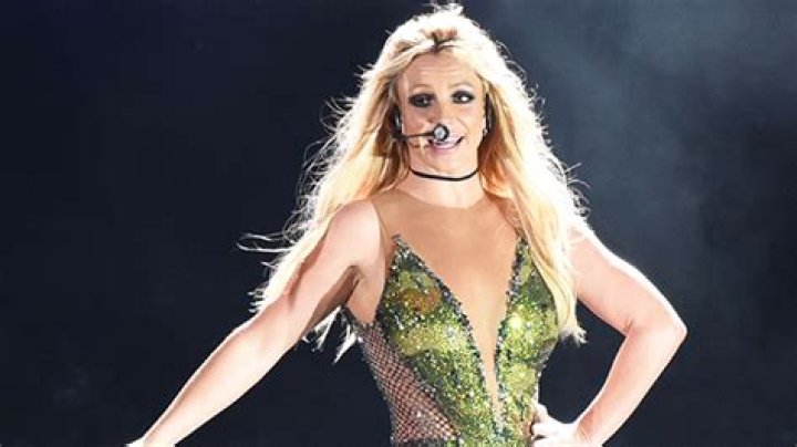 Britney Spears Gets Cheeky In Plunging Neon Swimsuit While Showing Off Her Dance Moves