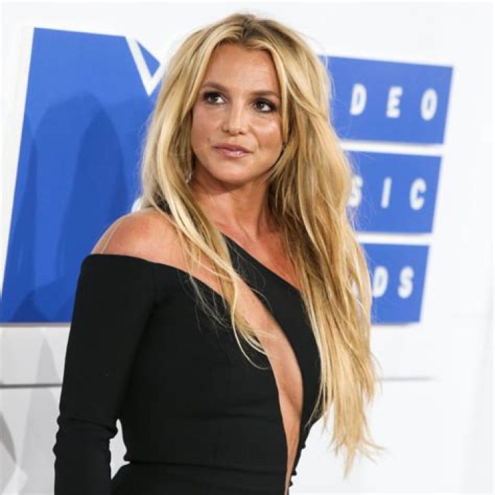 Britney Spears Teases Short Hair Makeover In New Topless Beach Video: Watch