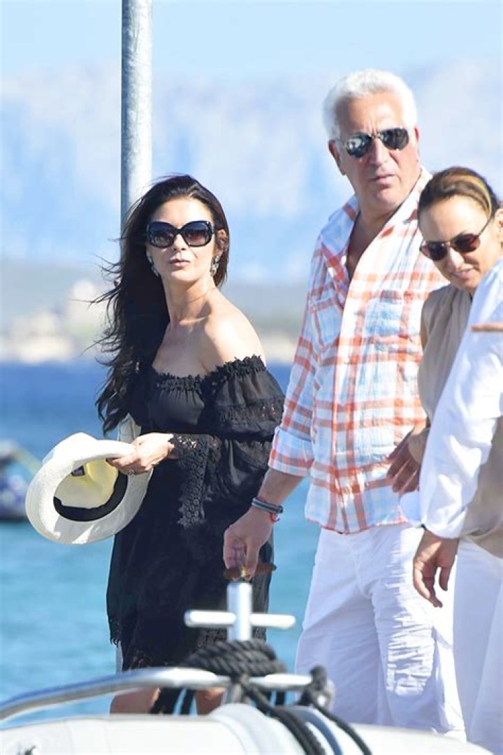 Catherine Zeta Jones Slays Plunging Swimsuit In Sexy Seflies – Hollywood Life