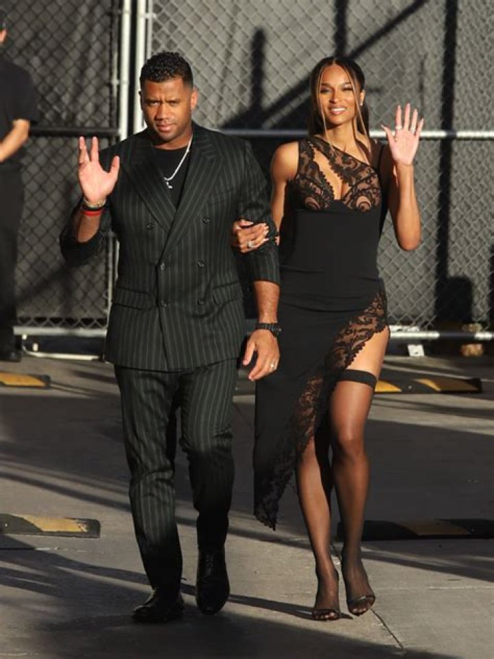 Ciara Rocks High-Slit Lace Dress With Sexy Stockings While Out With Russell Wilson