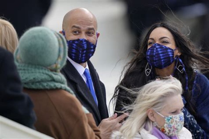 Rosario Dawson & Cory Booker Are A Clone Couple As They Wear Matching Masks To Inauguration