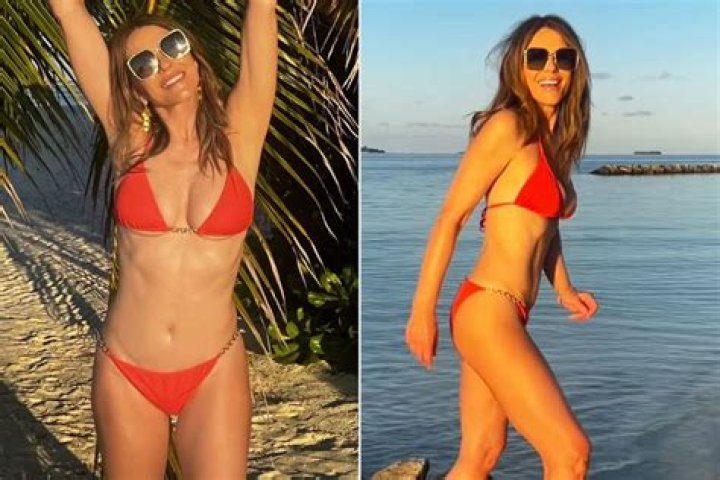 Elizabeth Hurley, 56, Rocks A Deep-Plunging Aqua Swimsuit While Vacationing In Wales