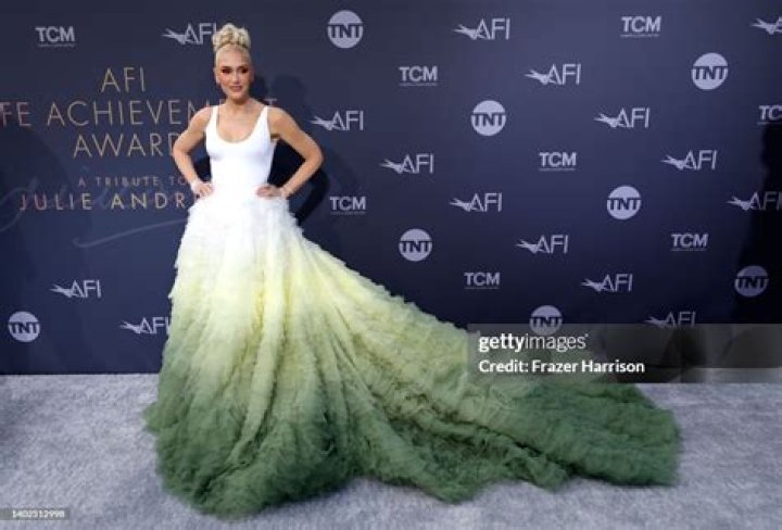 Gwen Stefani Rocks White & Green Dress With Massive Train At AFI Life Achievement Award Gala