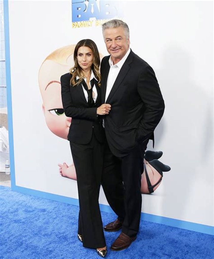 Hilaria Baldwin Supports Alec By Cuddling Up To Him In 1st Photo After Manslaughter Charges Dropped