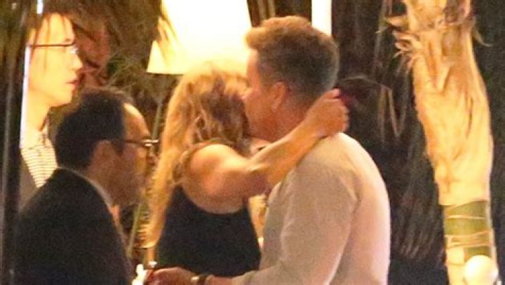 Jennifer Aniston Kisses & Embraces Mystery Man While Leaving Dinner With Friends — Pic