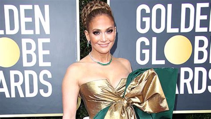Jennifer Lopez Stuns In Floor Length Silver & Green Gown For Christmas: Photo