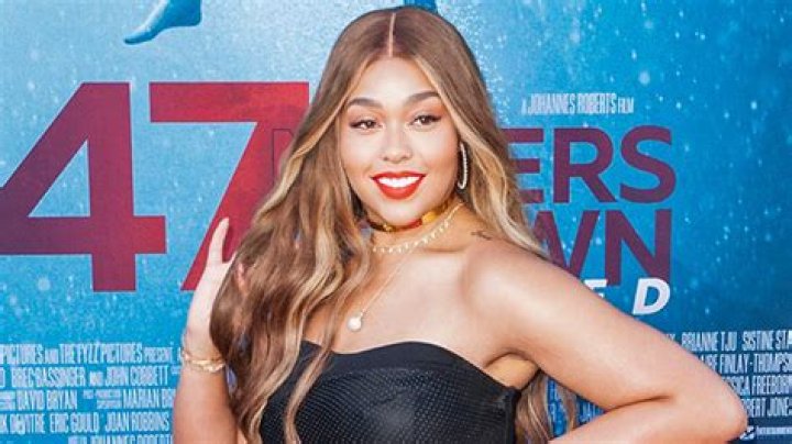 Jordyn Woods Loves Her Curves While Lounging By the Pool In Her Bikini — Pic
