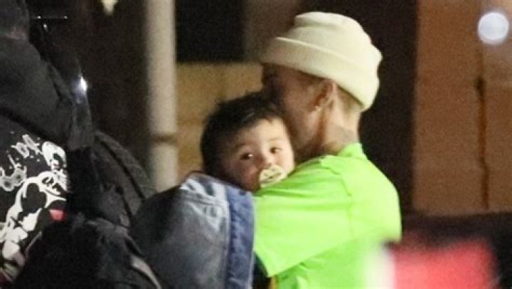 Justin Bieber Kisses A Friend’s Baby At Late Night Dinner After Hailey Teases Their Family Plans