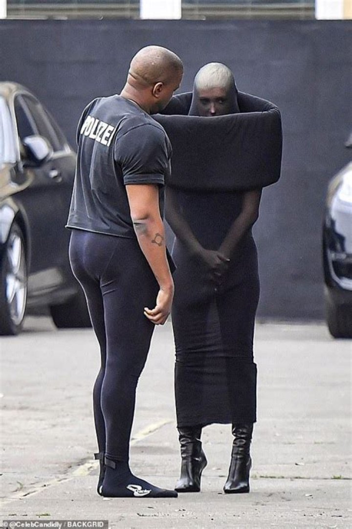 Kanye West & Wife Bianca Censori Hold Hands as She Shows Her Partial Lower Backside in Neon Leggings