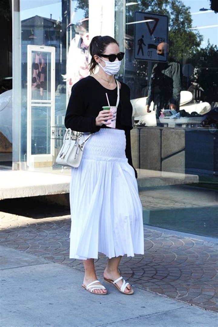 Katharine McPhee Reveals Her Baby Bump In High-Waisted White Skirt While Running Errands — Pics