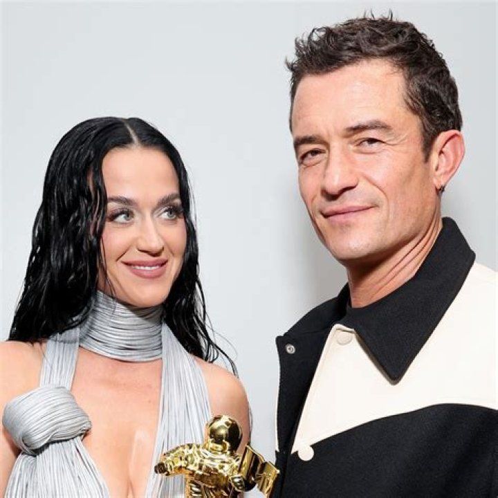 Katy Perry Steps Out With Baby Daisy, 7 Mos., & The Pair Look Adorable In Matching Sun Hats