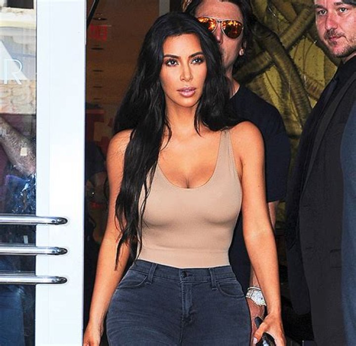 Kim Kardashian Shows Off Black Bodysuite & Heels In New SKIMS Pic – Hollywood Life
