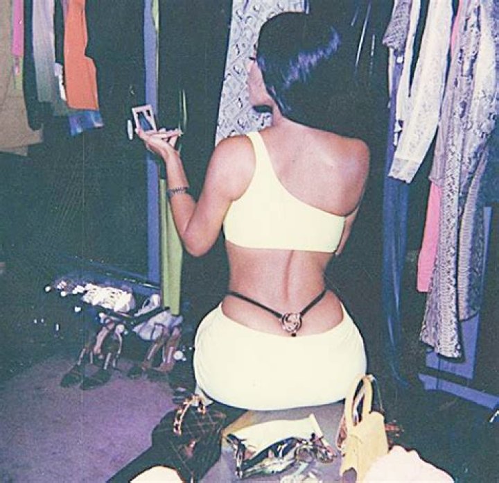 Kim Kardashian Puts Super Skimpy Thong On Full Display As She Kneels Down In Tight Skirt