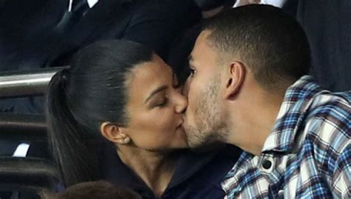 Kourtney Kardashian Passionately Kisses Younes In Paris, But He Looks SUPER Distracted — See Pic