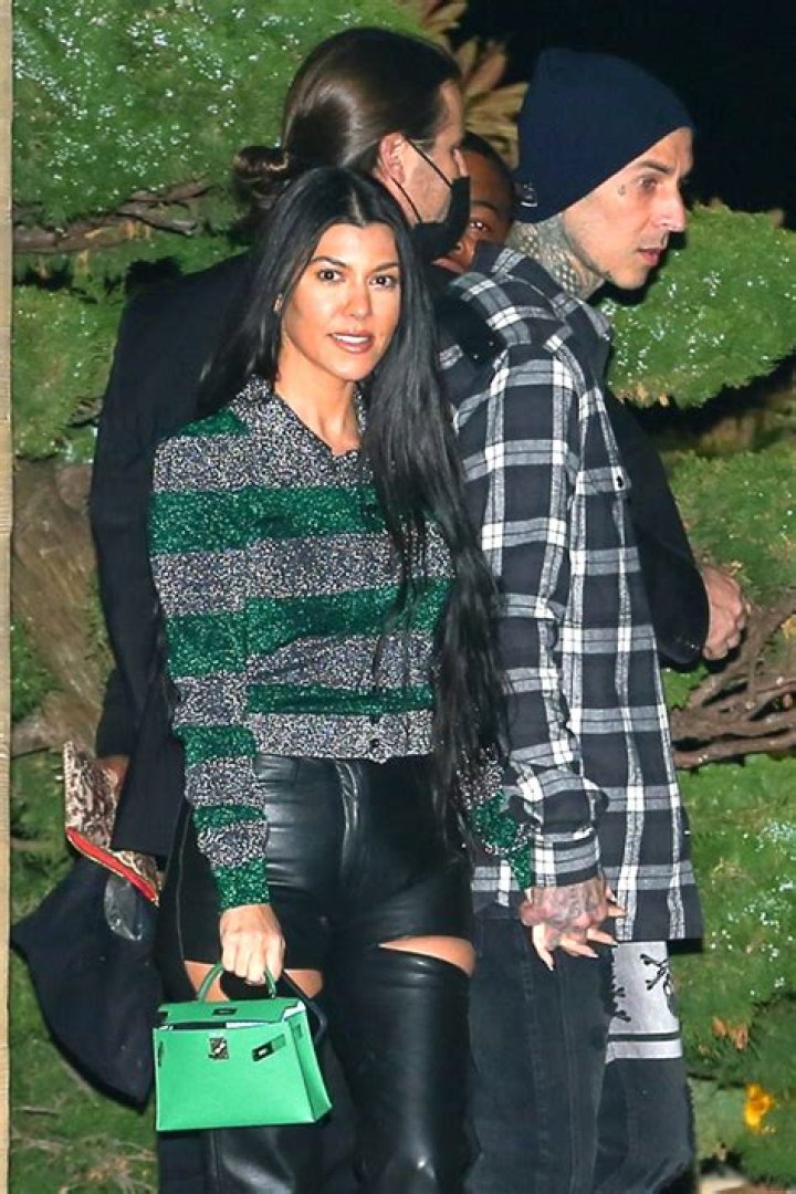 Kourtney Kardashian Proudly Rocks Travis Barker’s Blink 182 Merch In New Photo