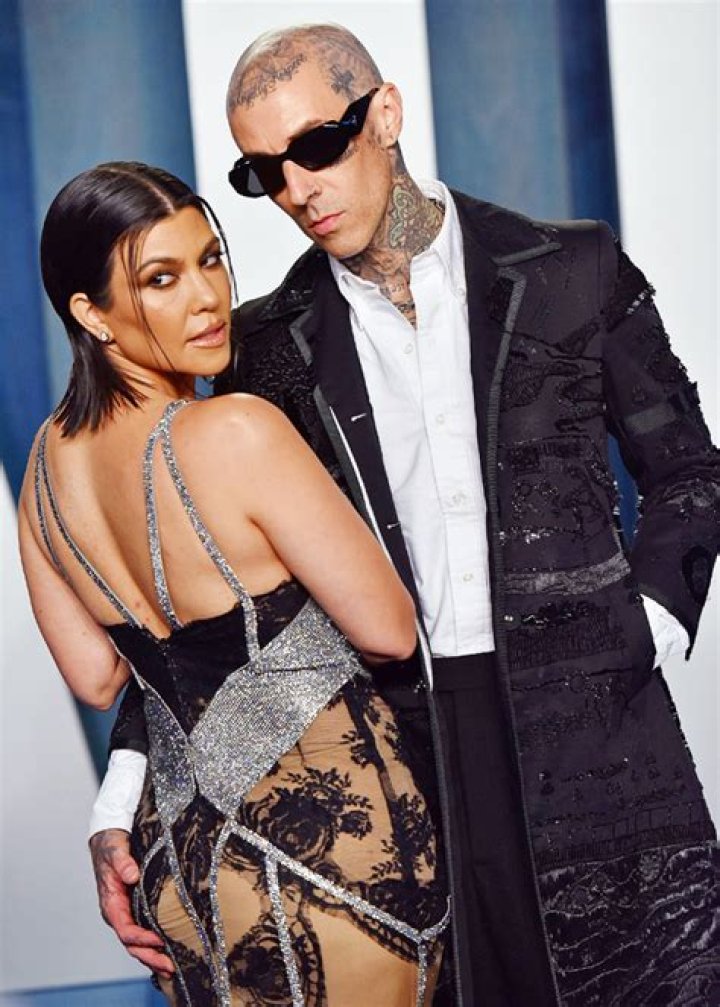 Kourtney Kardashian & Travis Barker Reportedly Working On Postnup After Marrying Without Prenup