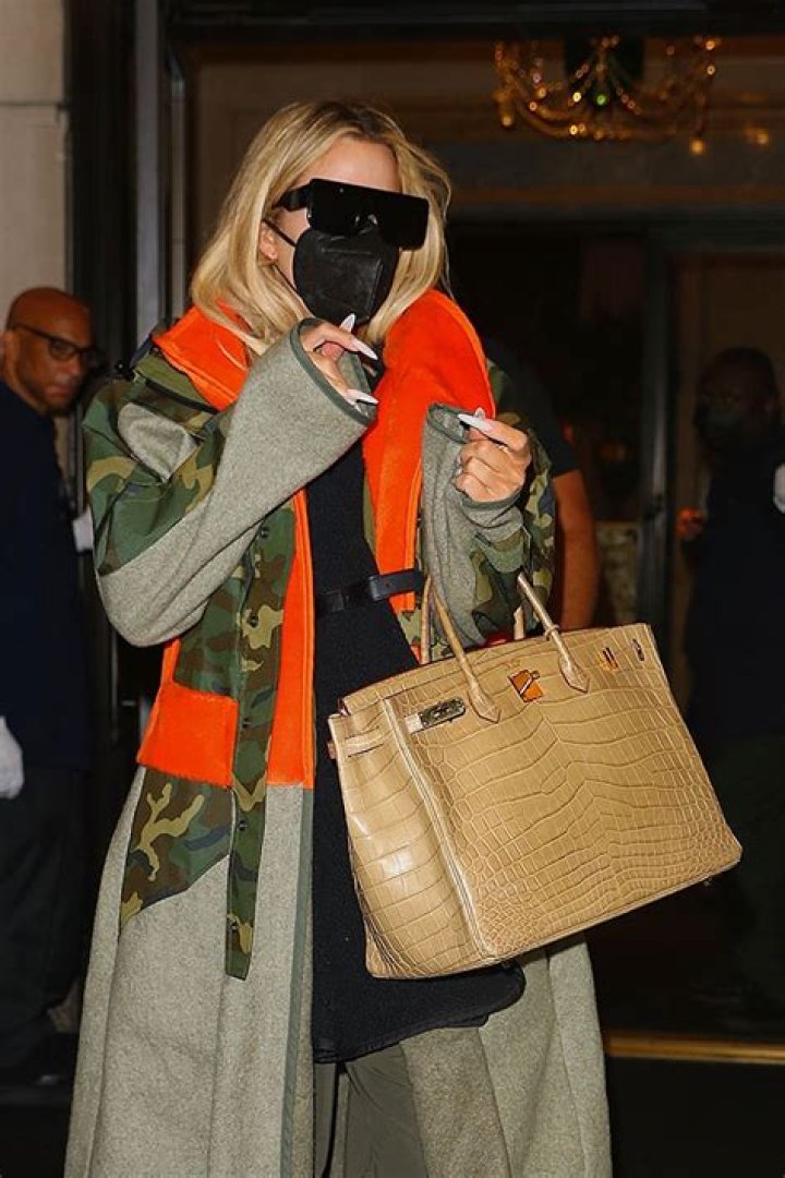 Kris Jenner Bundles Up In A Red Coat After Kim’s ‘SNL’ Debut With Khloe & Corey Gamble