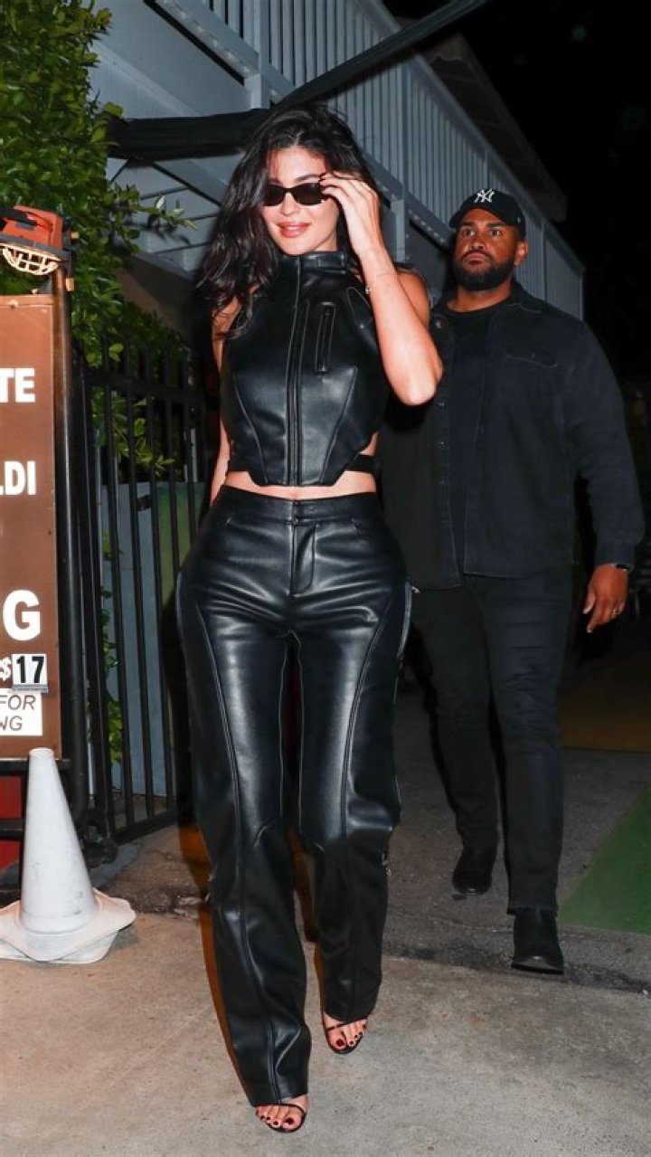 Kylie Jenner Rocks Leather Jumpsuit For Makeup Line Party: Video – Hollywood Life