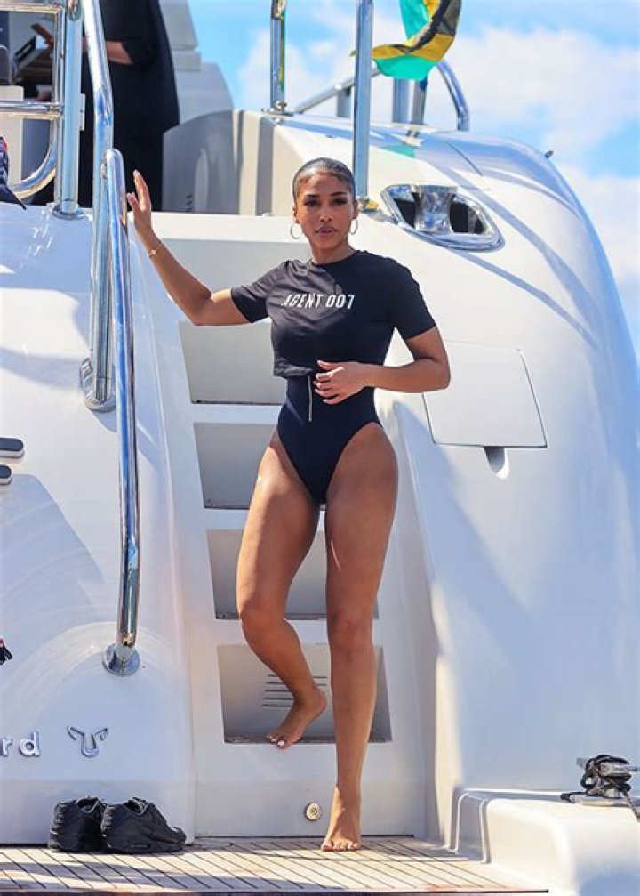 Lori Harvey Rocks Black Swimsuit On A Yacht For Photo Shoot With Olivia Culpo & More
