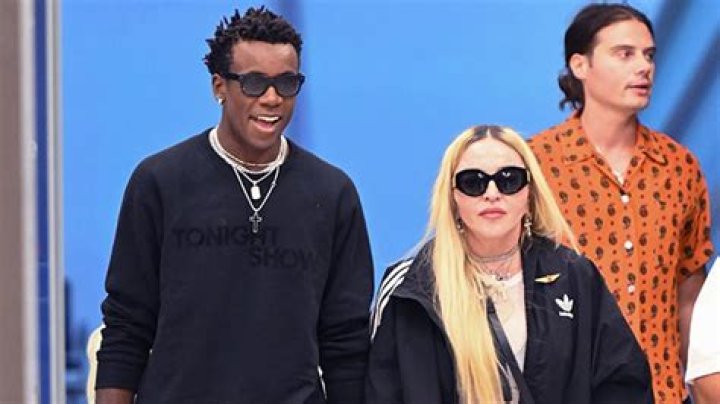 Madonna Spotted Going Through Airport Security with Son David Banda, 16, In Sheer Top