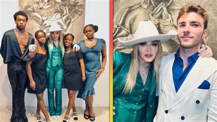 Madonna’s Son David Banda Rocks White Dress For Epic Runway Strut – Hollywood Life