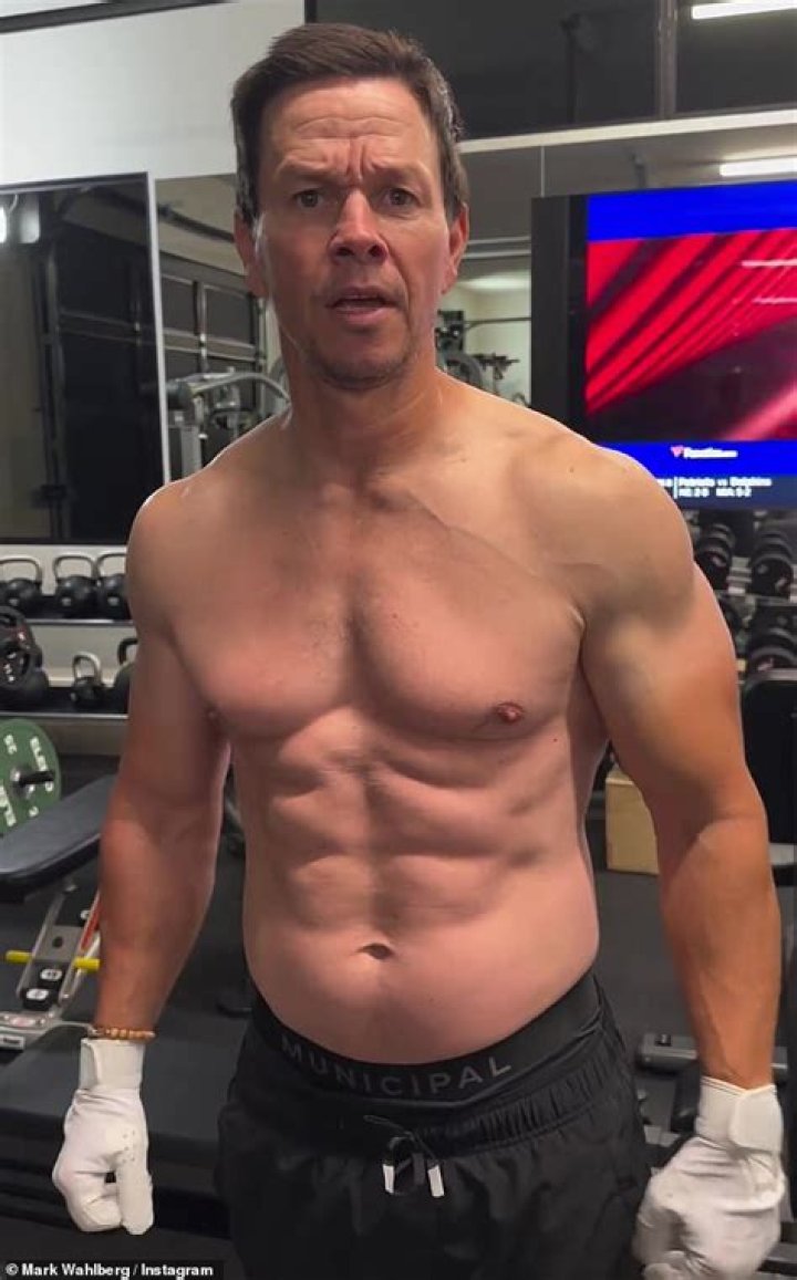 Mark Wahlberg Reveals Arm Muscles & Abs As He Hits The Gym To Lose 20 Lbs. He Gained For Movie