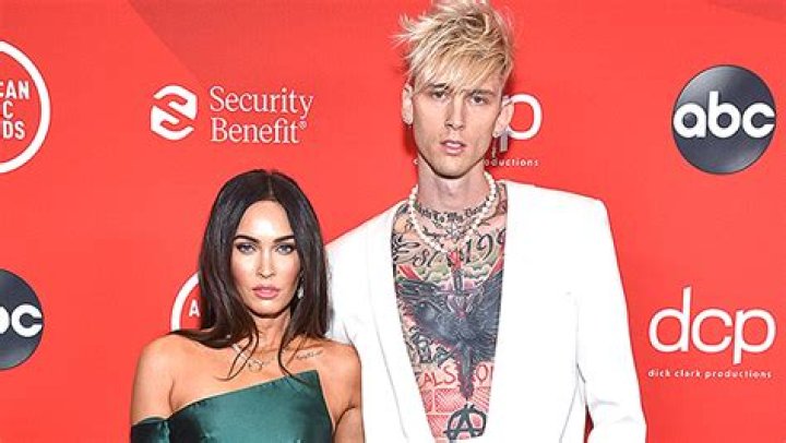 Megan Fox Rocks A Crop Top & Skirt In New Photos With Racy Caption & MGK Responds