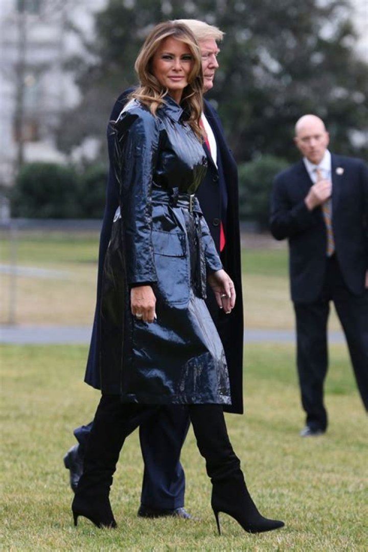 Melania Trump’s Heeled Boots Sink Into White House Grass On Way To College Football Game