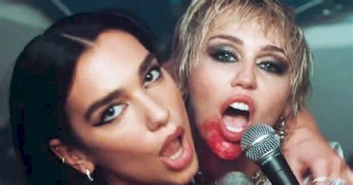 Miley Cyrus & Dua Lipa Get Hot & Heavy In ‘Prisoner’ Music Video – Hollywood Life