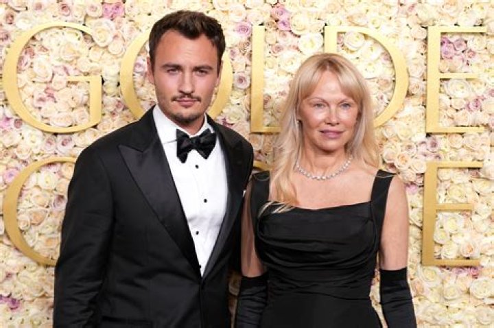 Pam Anderson Slays In Romper & Heels While Out With Son Brandon After Divorce