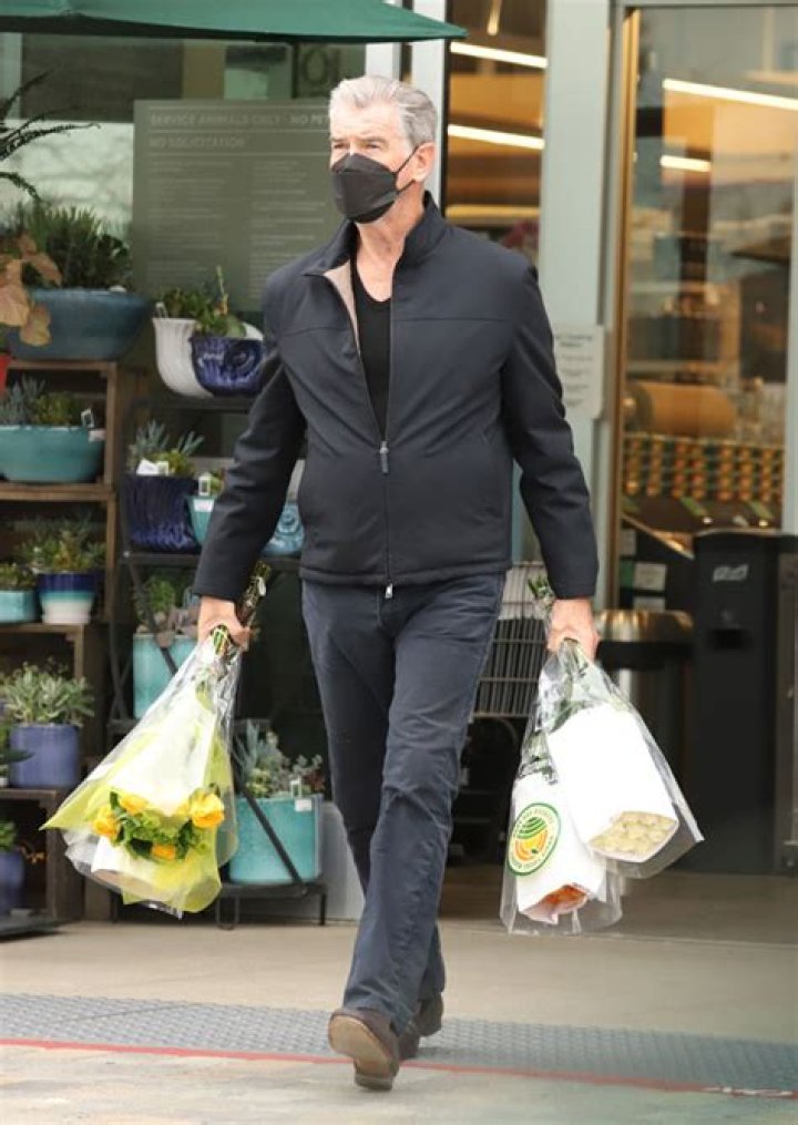 Pierce Brosnan Rocks Gray Hair Holding Bouquets Of Flowers — Photos – Hollywood Life