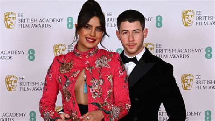 Priyanka Chopra Wears Daring Front Slit Blouse & PDAs With Nick Jonas On The BAFTAs Red Carpet — Pics