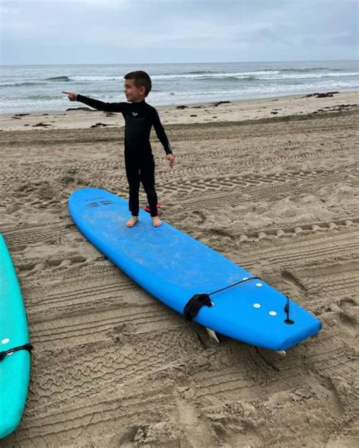 Reign Disick, 6, Looks Too Cool While Posing On A Surfboard At The Beach — Pics