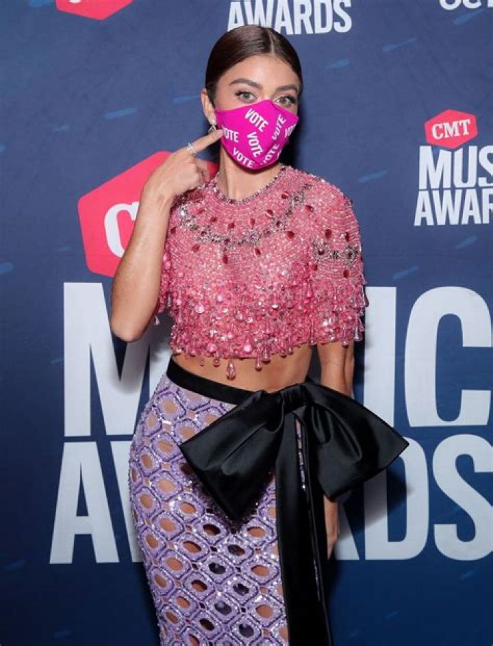 Sarah Hyland Stuns In Sequined Crop Top & Gorgeous Magenta Dress At CMT Music Awards