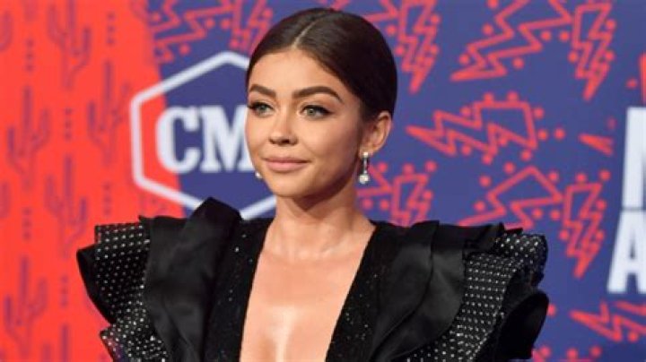 Sarah Hyland Nearly Suffers Wardrobe Malfunction In Paris & Fiance Wells Adams Doesn’t Mind