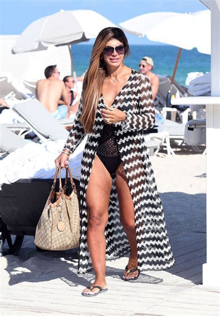 Teresa Giudice, 48, Rocks Sexy Pink Swimsuit By The Pool: ‘Missing The Sun’