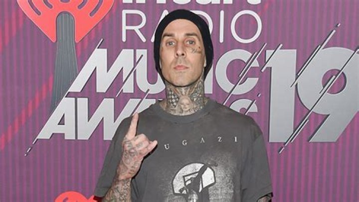Travis Barker Defends His Many Tattoos After To Internet Troll: ‘I Look Awesome’
