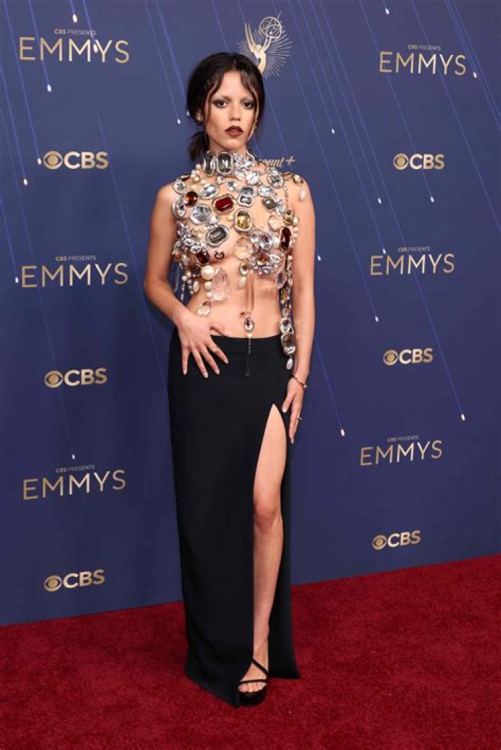 Zendaya Stuns In Custom Pearl & Crystal Embellished Bandeau & Polka Dot Skirt As She Accepts 1st Emmy
